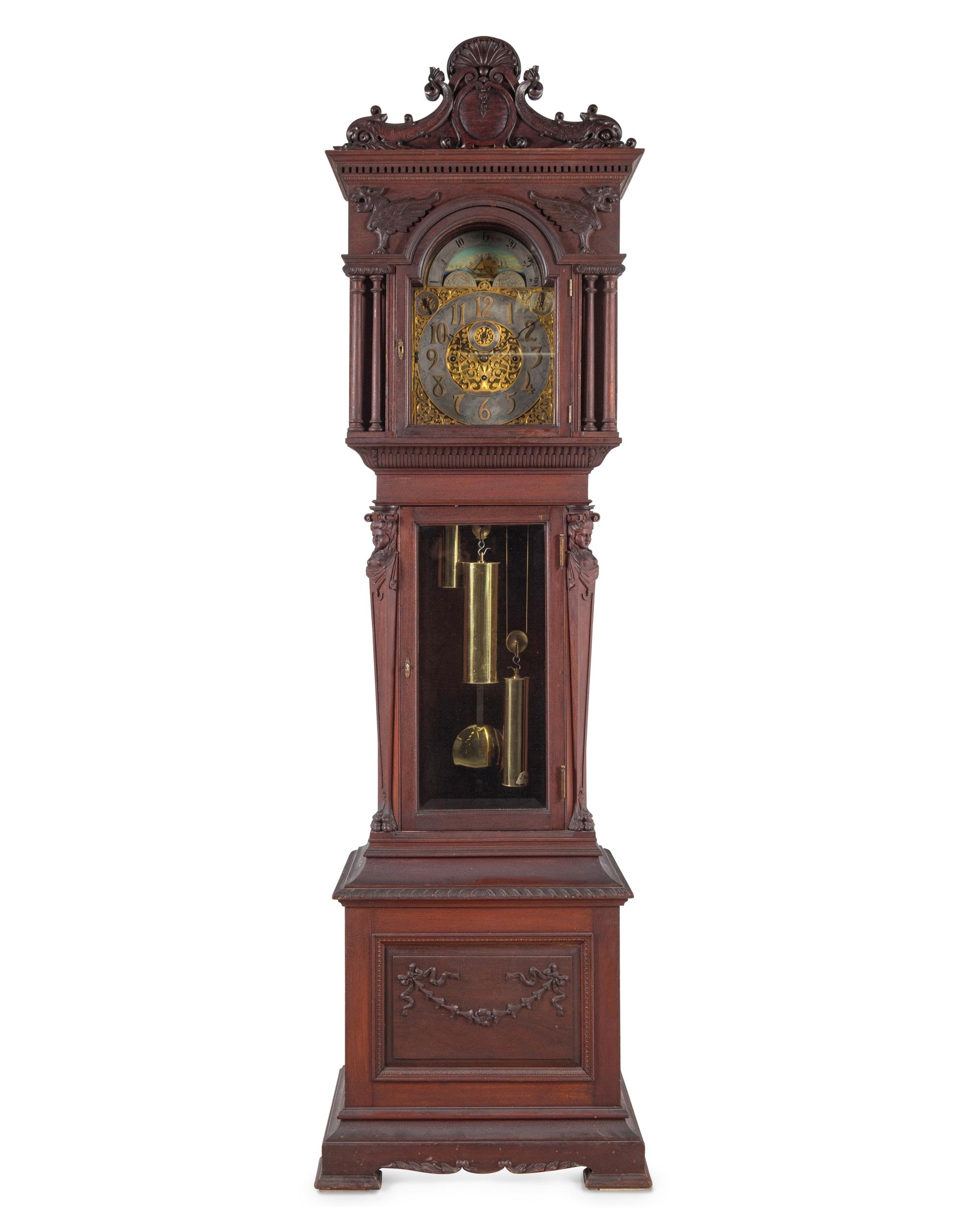 A Renaissance Revival Carved Walnut Tall Case Clock