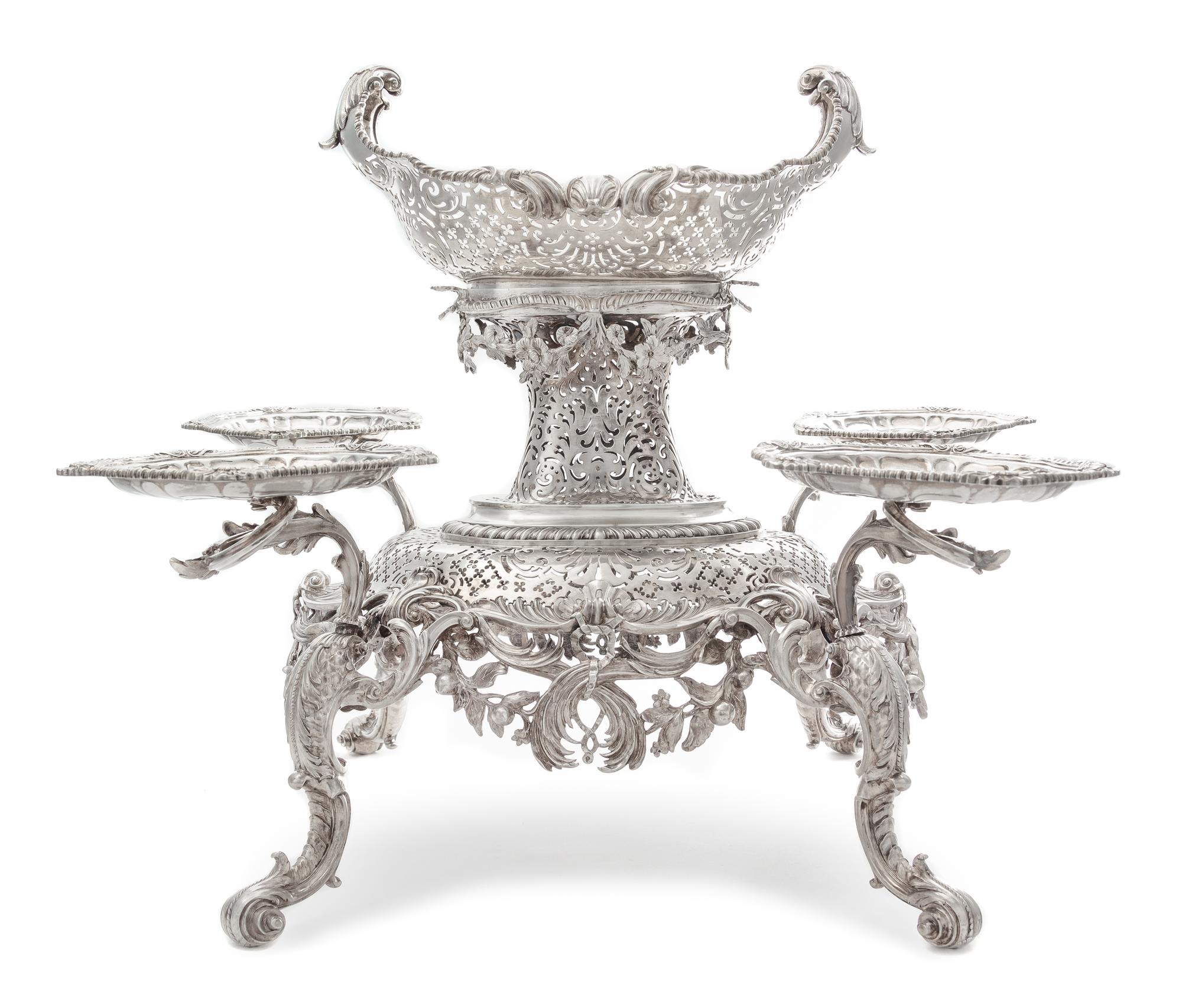 A George II Silver Epergne, Peter Archambo II & Peter Meure, London, 1753, the central basket of oval form with twin-foliate handles an
