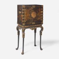 A Chinese Export gilt-decorated black lacquer table cabinet on a George I gilt-decorated and ebonized stand 18th century