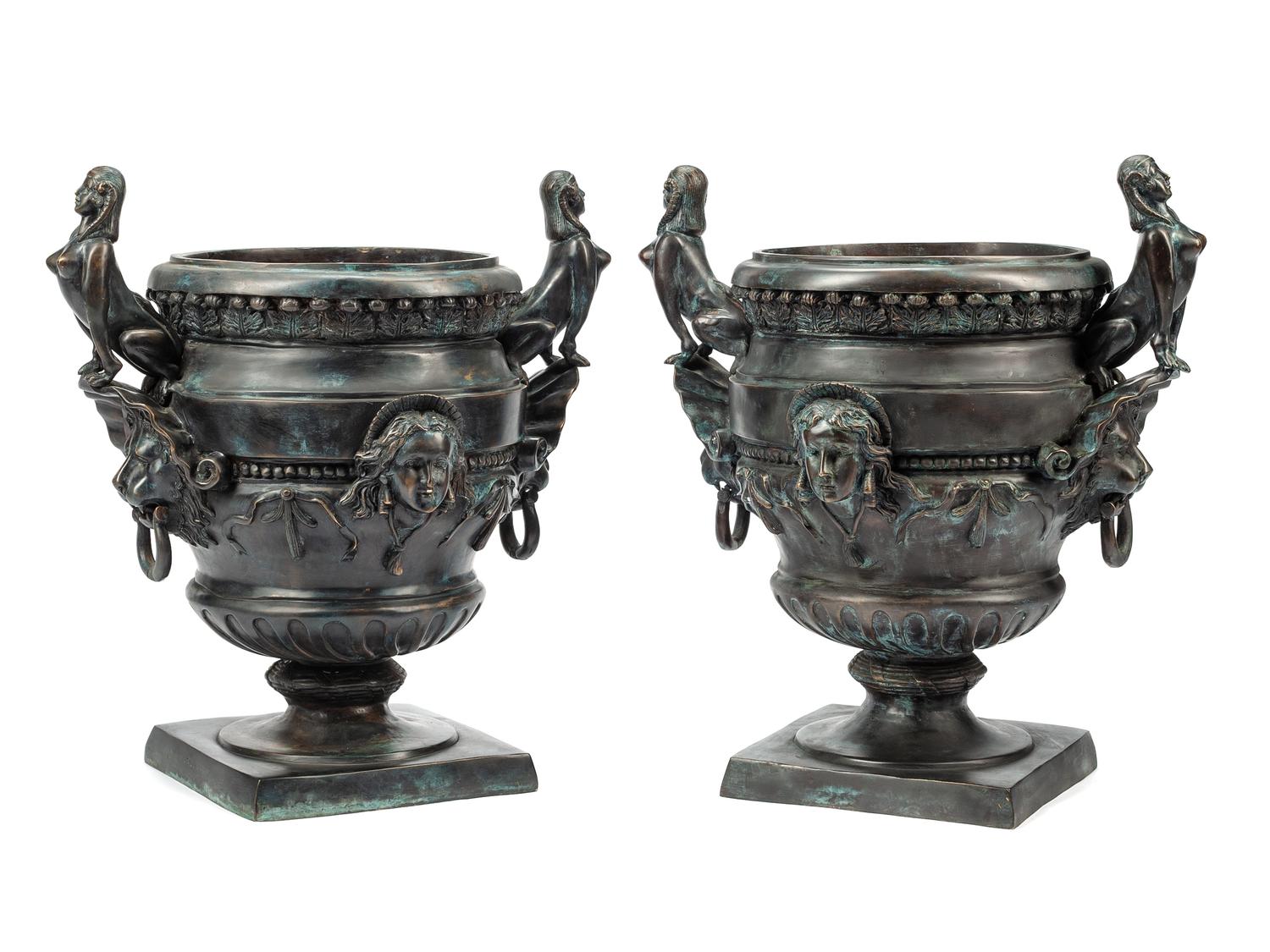 A Pair of Egyptian Revival Patinated Metal Planters