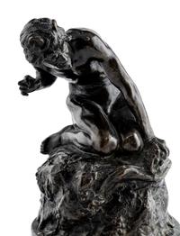 A Bronze Figure of Satyr on the Rocks