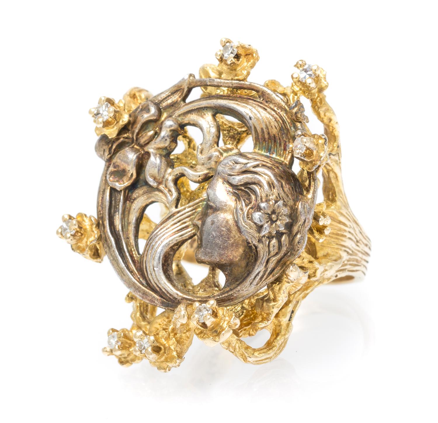 A 14 Karat Yellow Gold, Sterling Silver and Diamond Ring, 10.35 dwts.