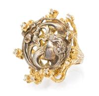 A 14 Karat Yellow Gold, Sterling Silver and Diamond Ring, 10.35 dwts.