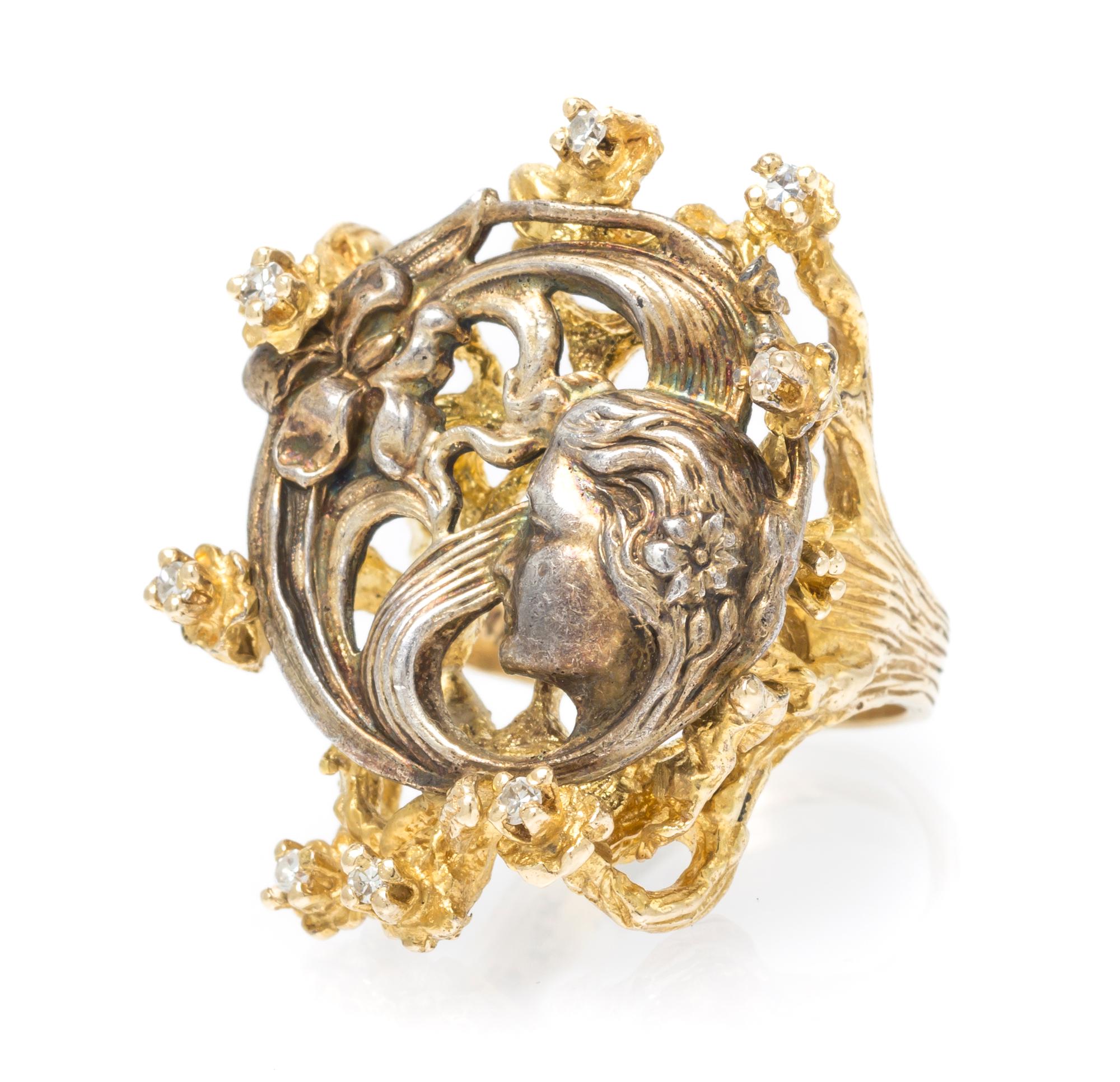 A 14 Karat Yellow Gold, Sterling Silver and Diamond Ring, 10.35 dwts.
