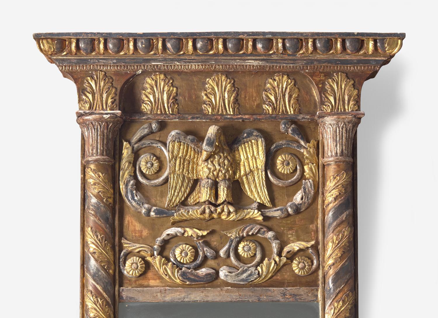 An Italian Parcel Gilt and Silvered Eagle Decorated Pier Mirror