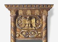 An Italian Parcel Gilt and Silvered Eagle Decorated Pier Mirror