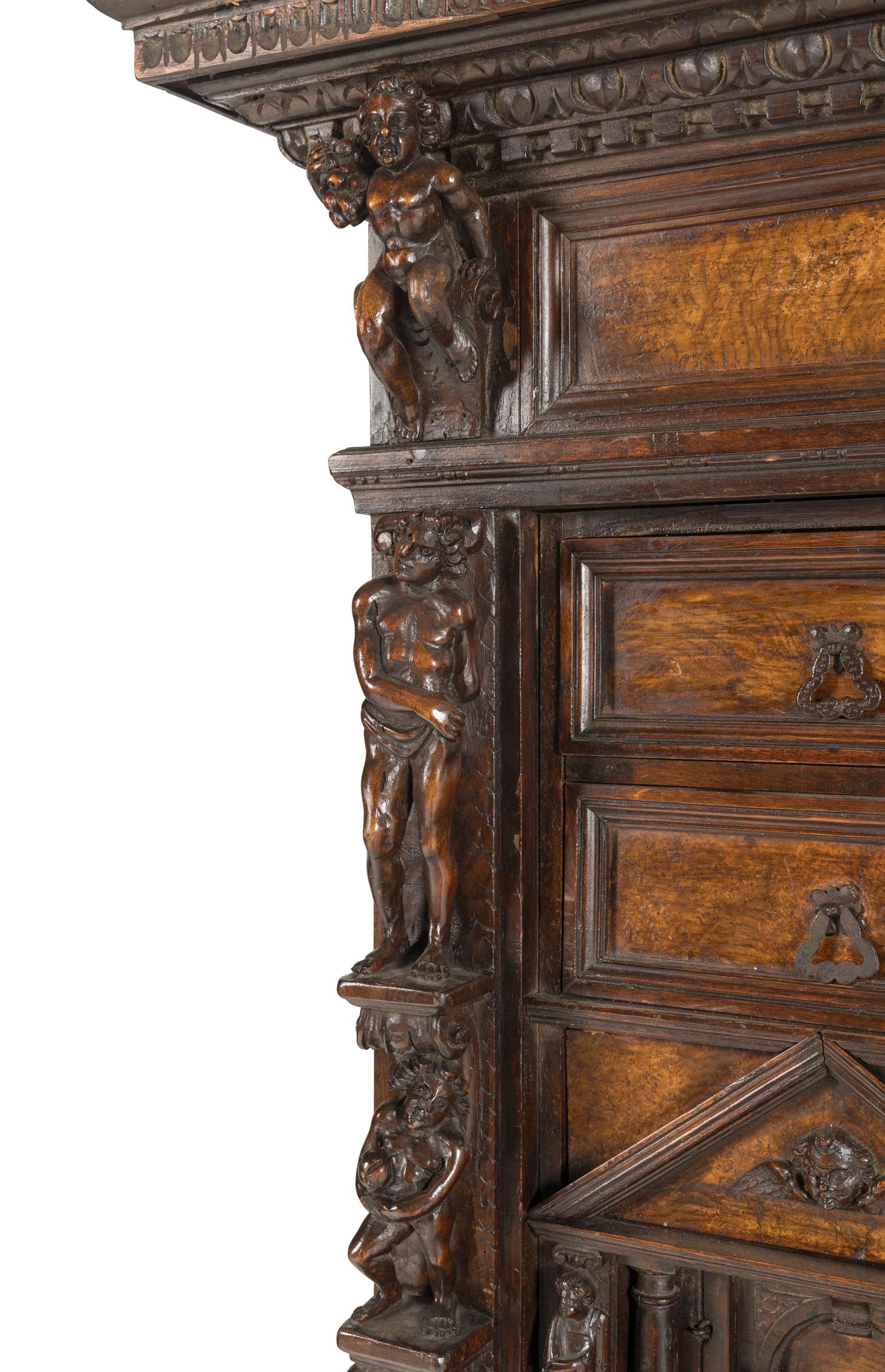 An Italian Renaissance Style Walnut Cabinet