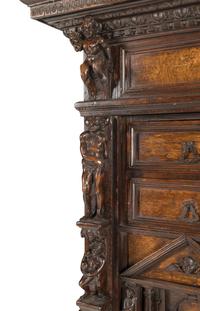 An Italian Renaissance Style Walnut Cabinet