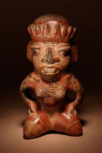 A Nicoya Polychrome Terracotta Seated Figure