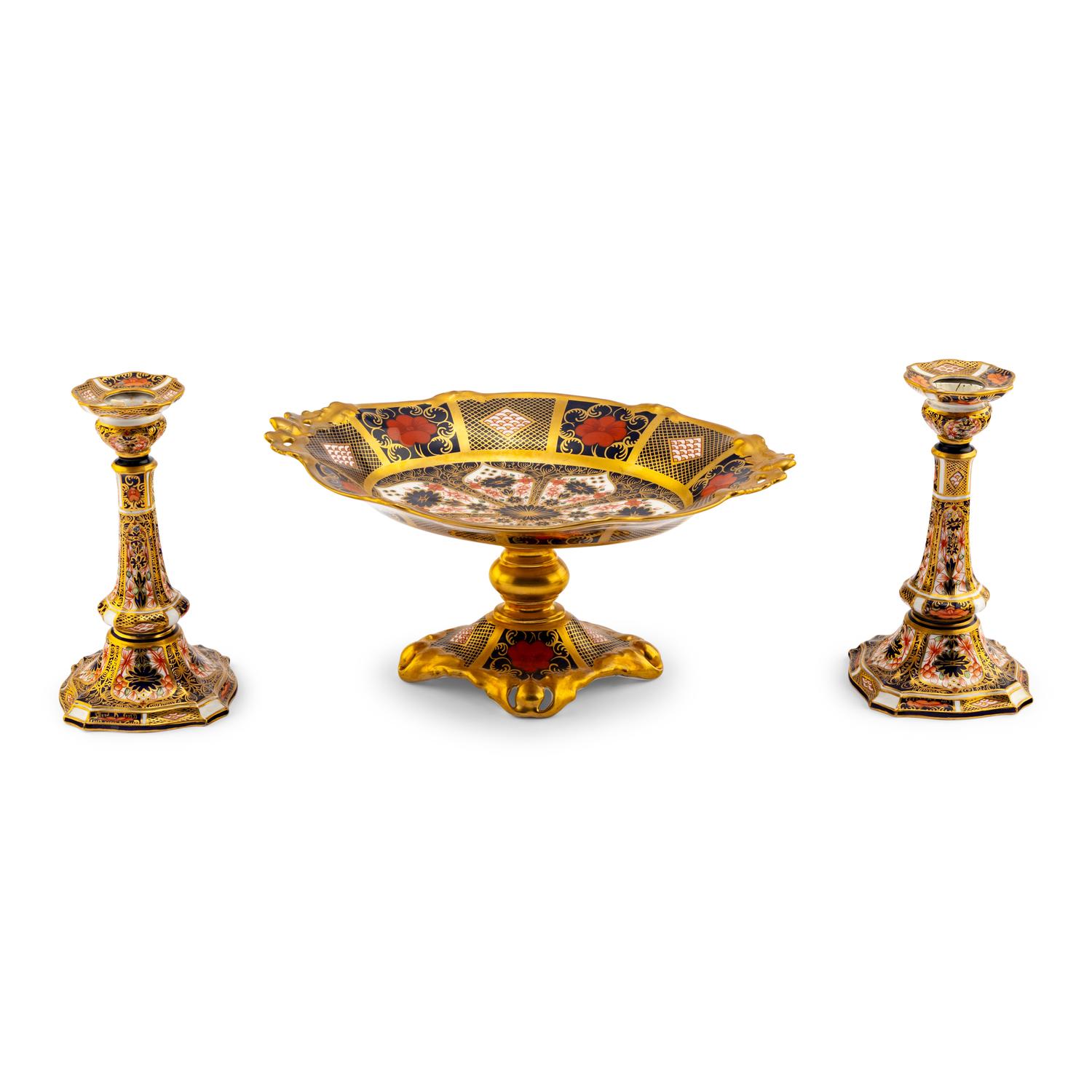 A Pair of Royal Crown Derby Imari Porcelain Candlesticks and a Tazza
