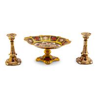 A Pair of Royal Crown Derby Imari Porcelain Candlesticks and a Tazza