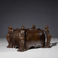An Art Nouveau Figural Footed Jardinière