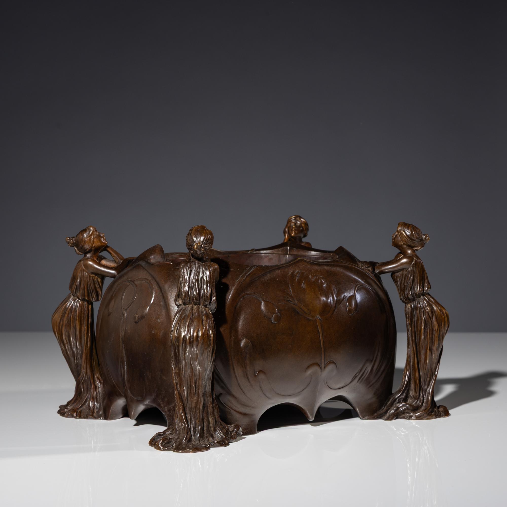 An Art Nouveau Figural Footed Jardinière