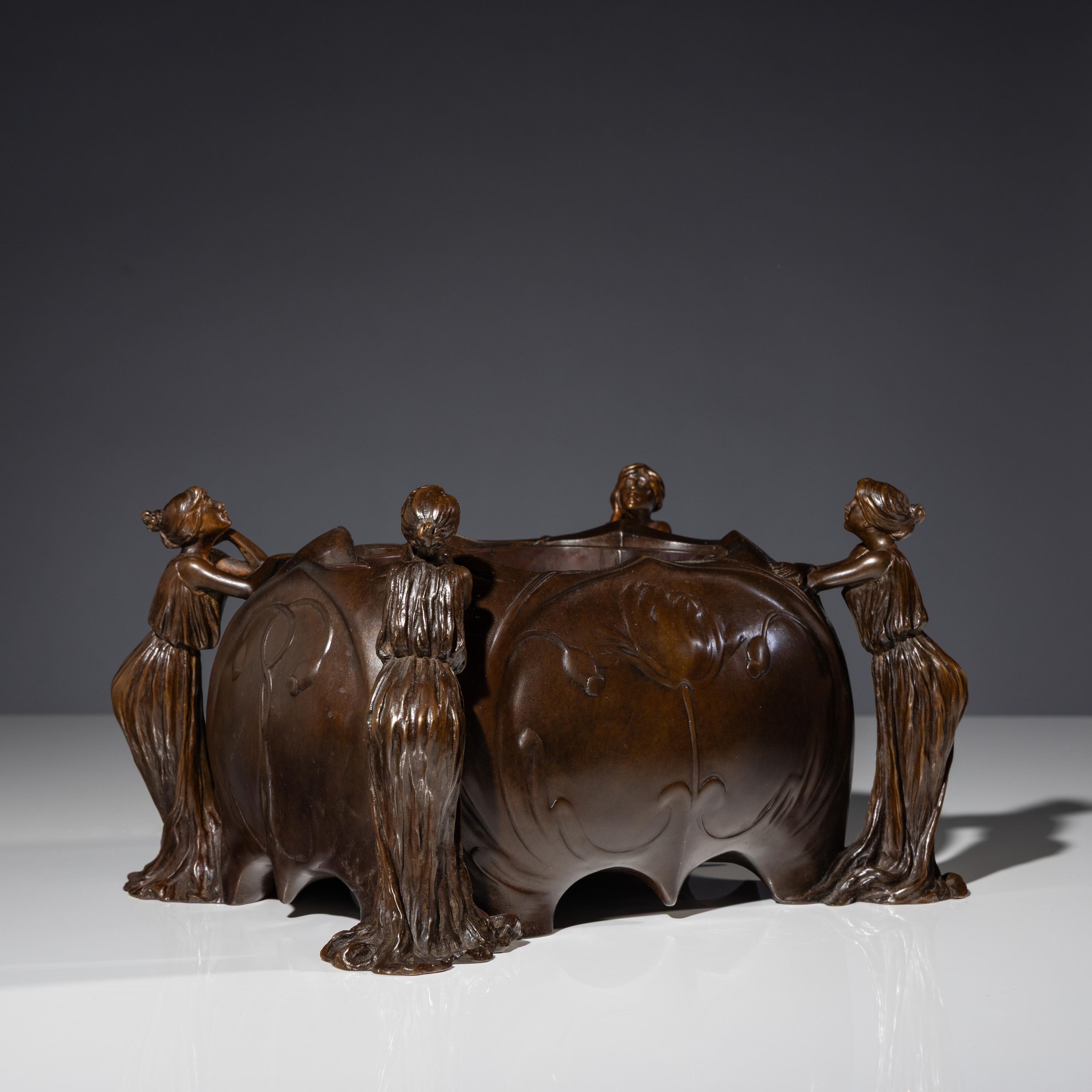 An Art Nouveau Figural Footed Jardinière