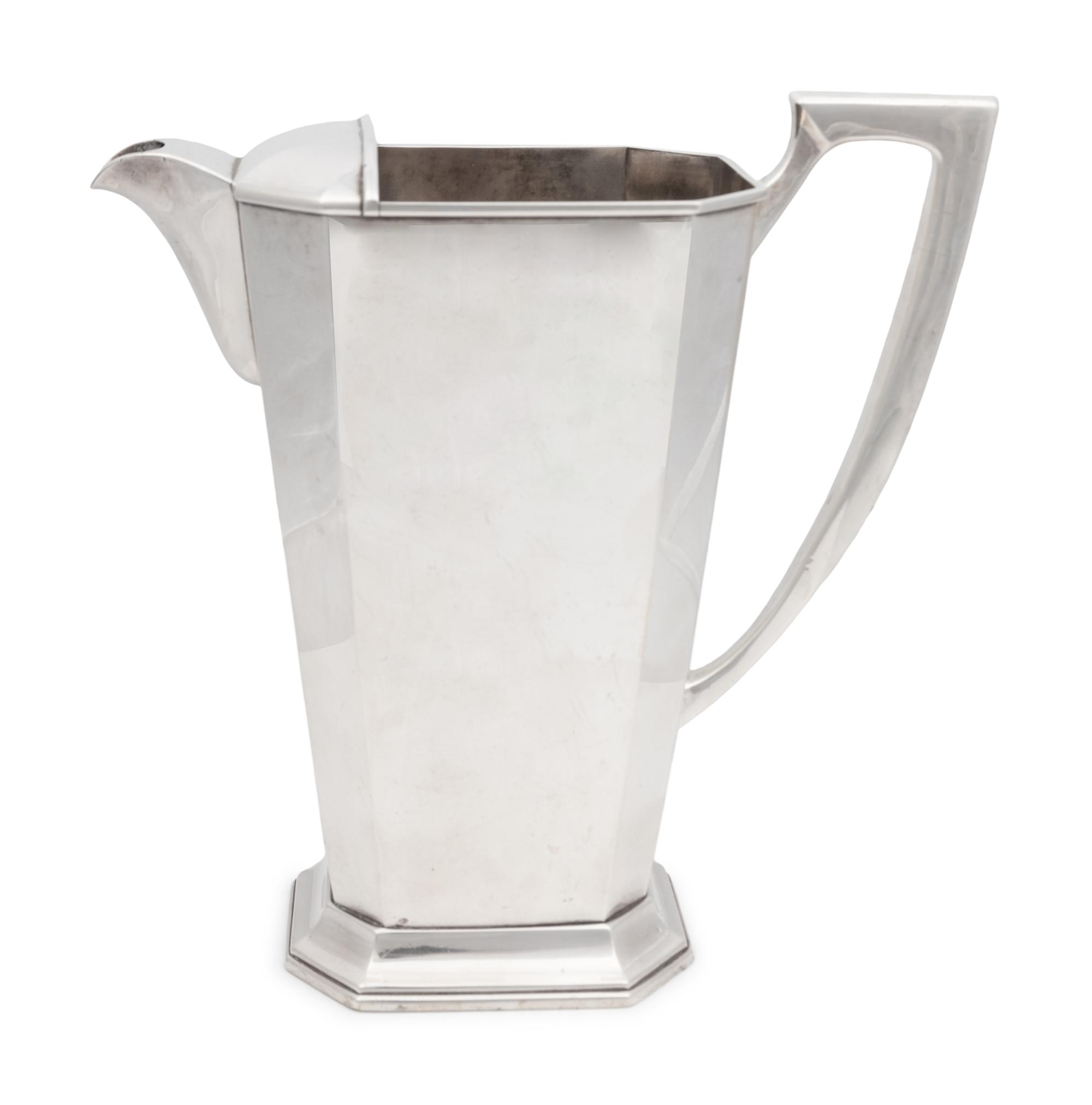A Japanese Silver Water Pitcher