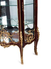 A Pair of Louis XV Style Gilt Bronze Mounted Mahogany Vitrine Cabinets