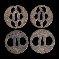 Group of eight assorted Japanese tsuba Meiji period and earlier