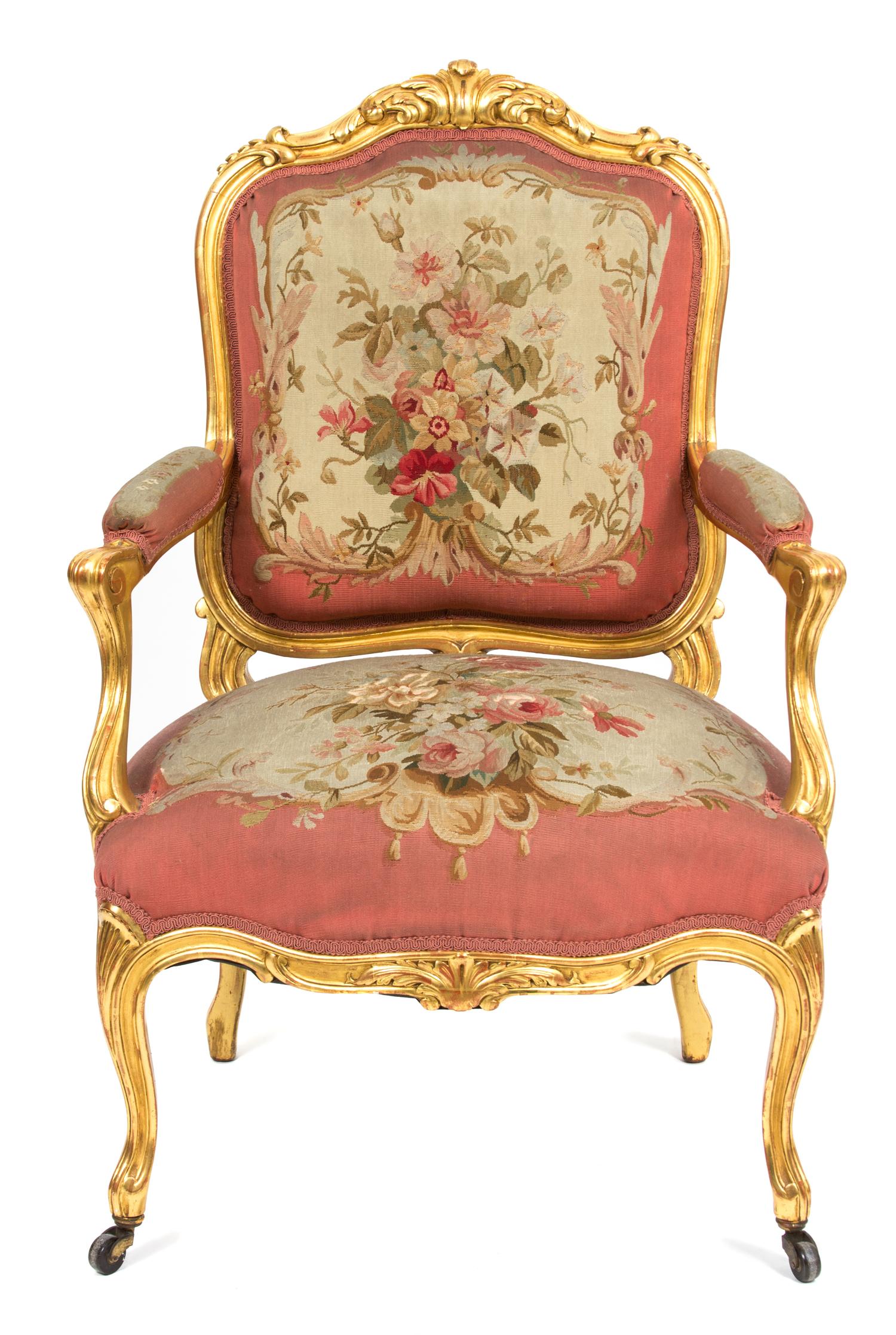 An Italian Louis XV Style Giltwood Fauteuil Height 39 inches. — 19TH CENTURY