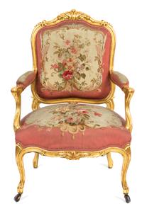 An Italian Louis XV Style Giltwood Fauteuil Height 39 inches. — 19TH CENTURY