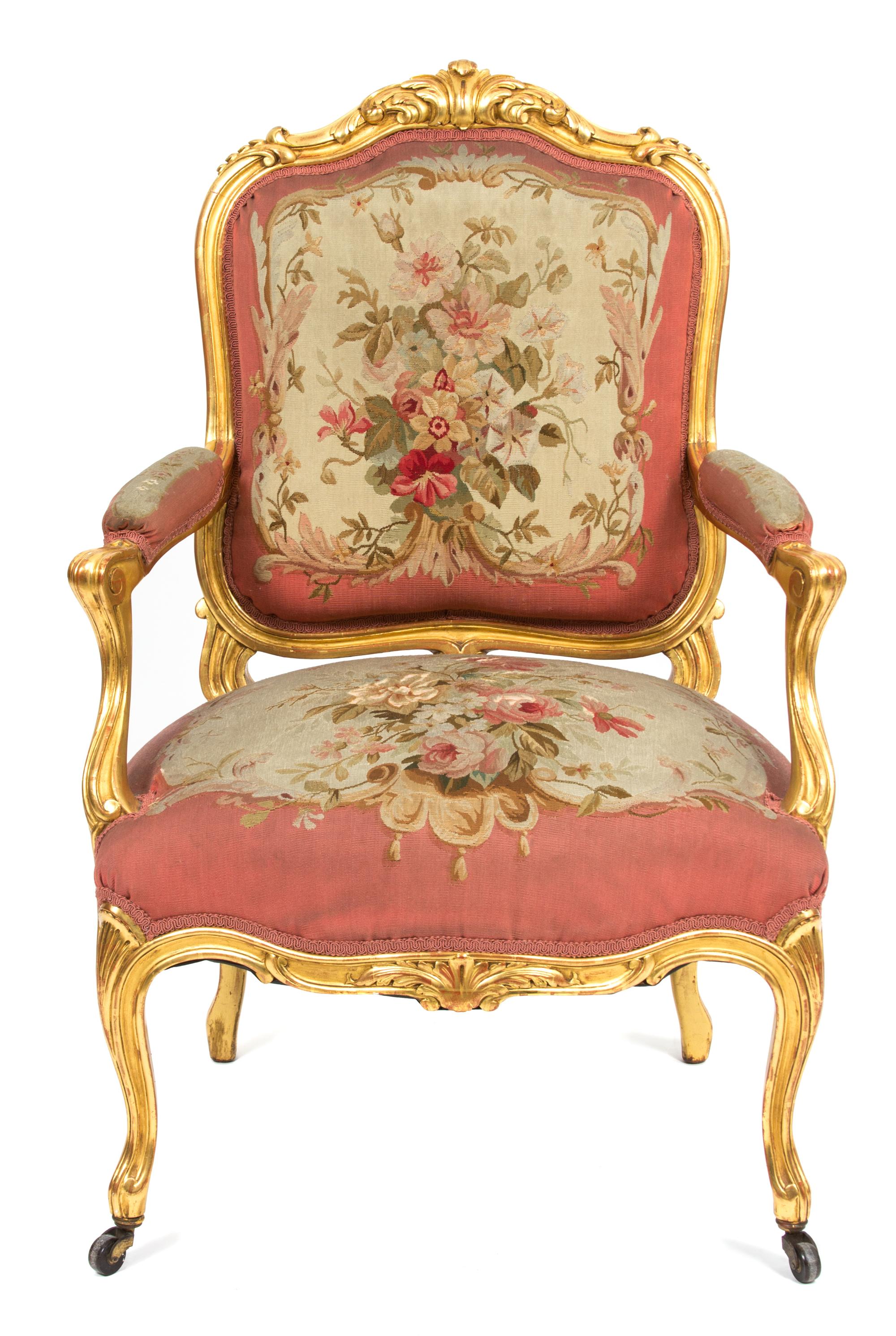 An Italian Louis XV Style Giltwood Fauteuil Height 39 inches. — 19TH CENTURY