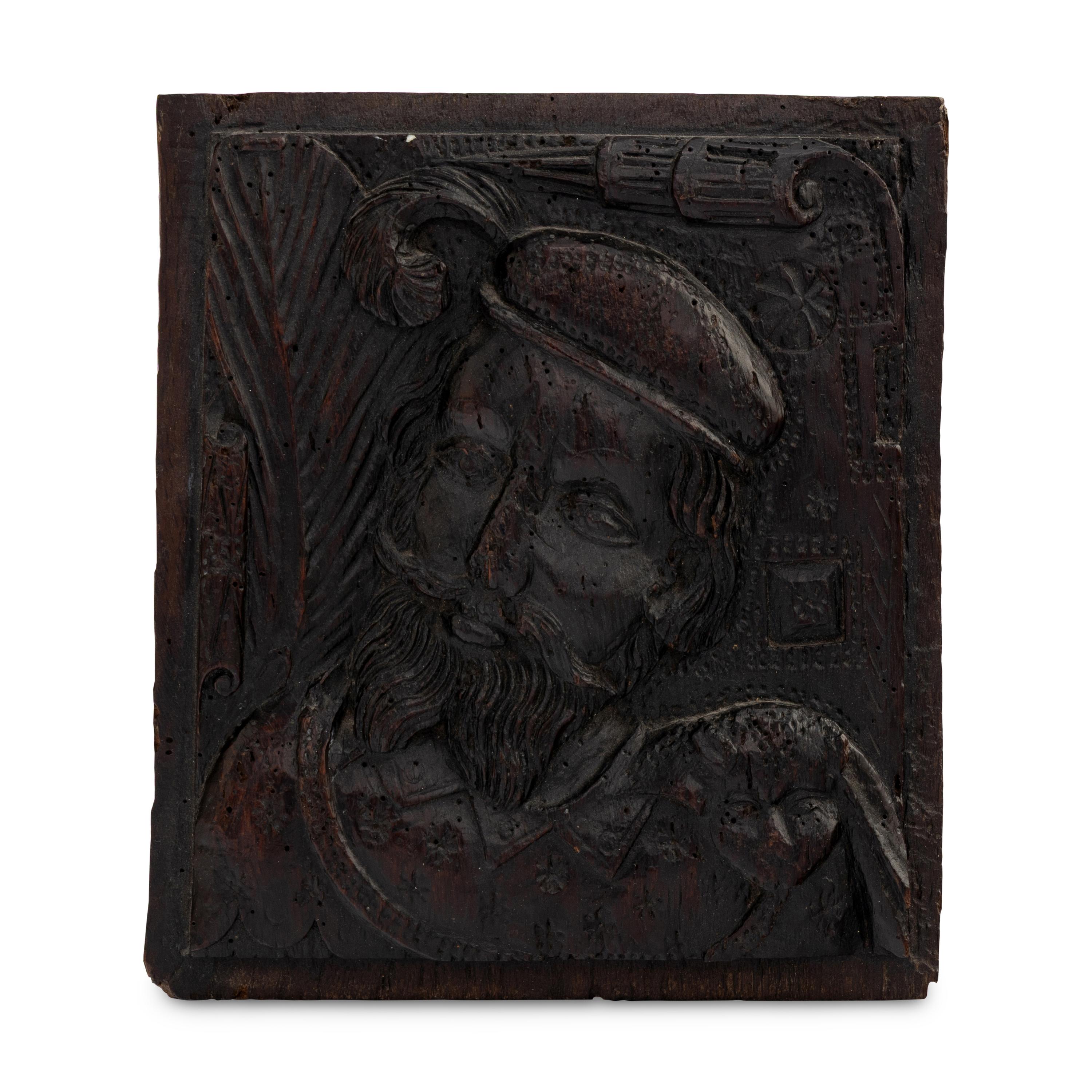 An English Carved Oak Portrait Panel
