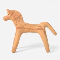 A Boeotian terracotta figure of a horse circa 6th century B.C.