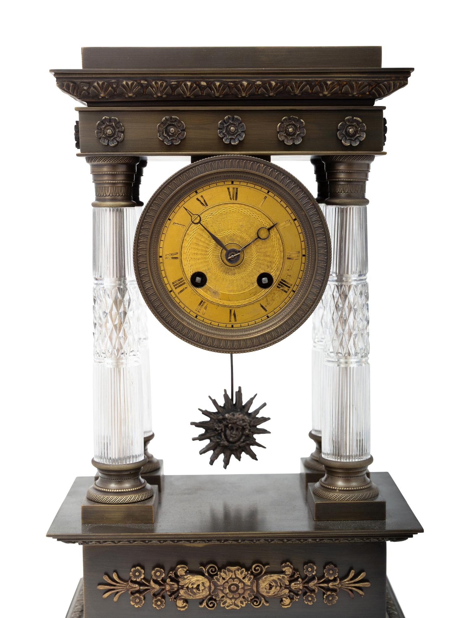 An Empire Style Bronze and Cut Glass Mantel Clock