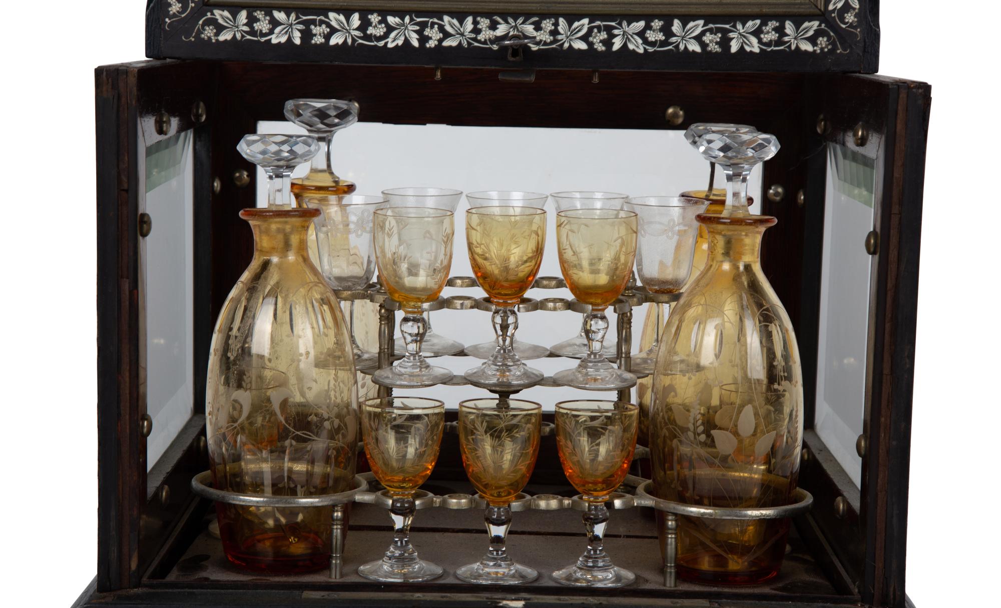 A French Ebonized and Inlaid Cave à Liqueur with Amber Glass Decanters — LATE 19TH CENTURY