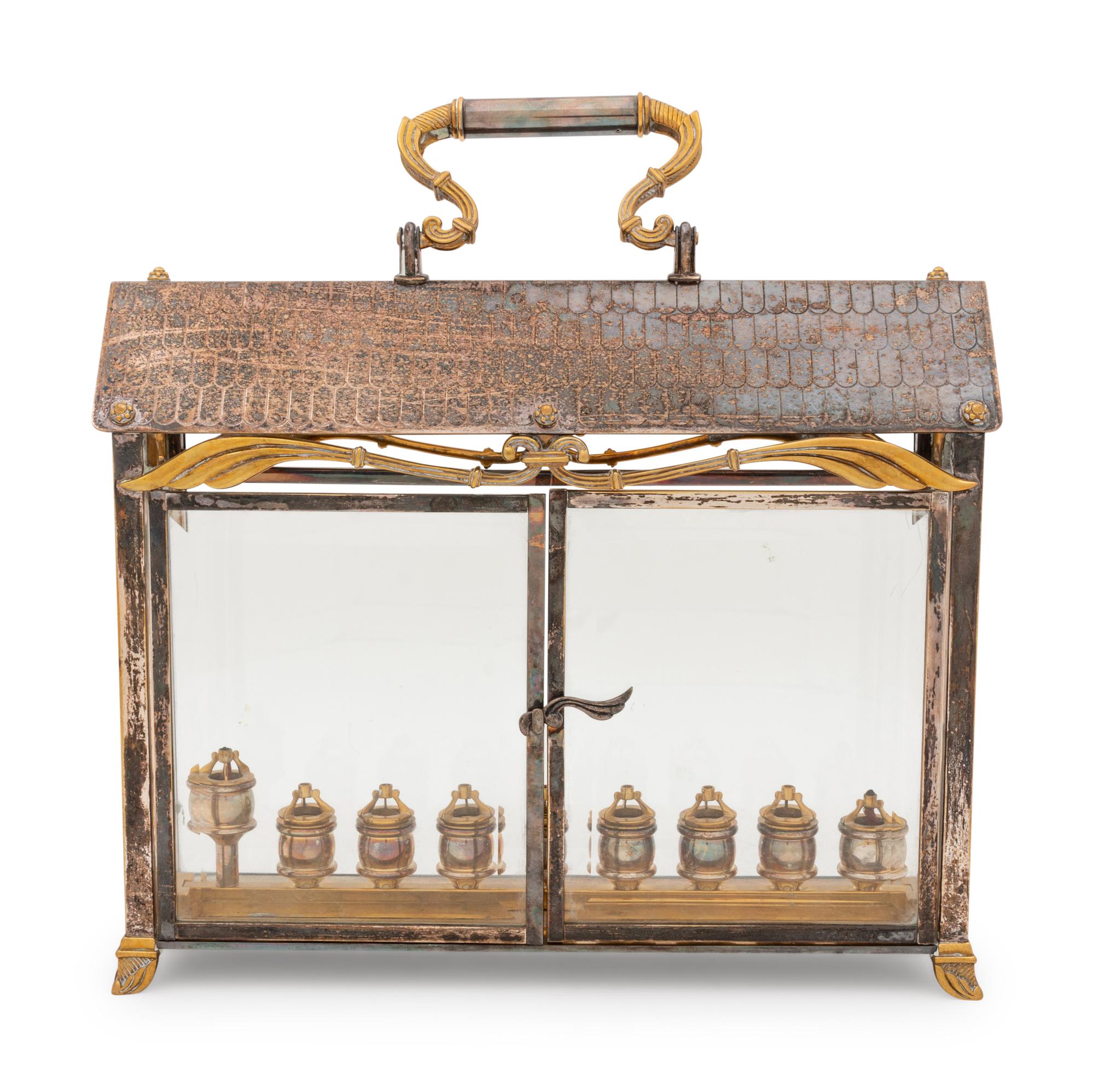 A Yossi Swed Silver, Silver-Gilt and Glass Menorah
