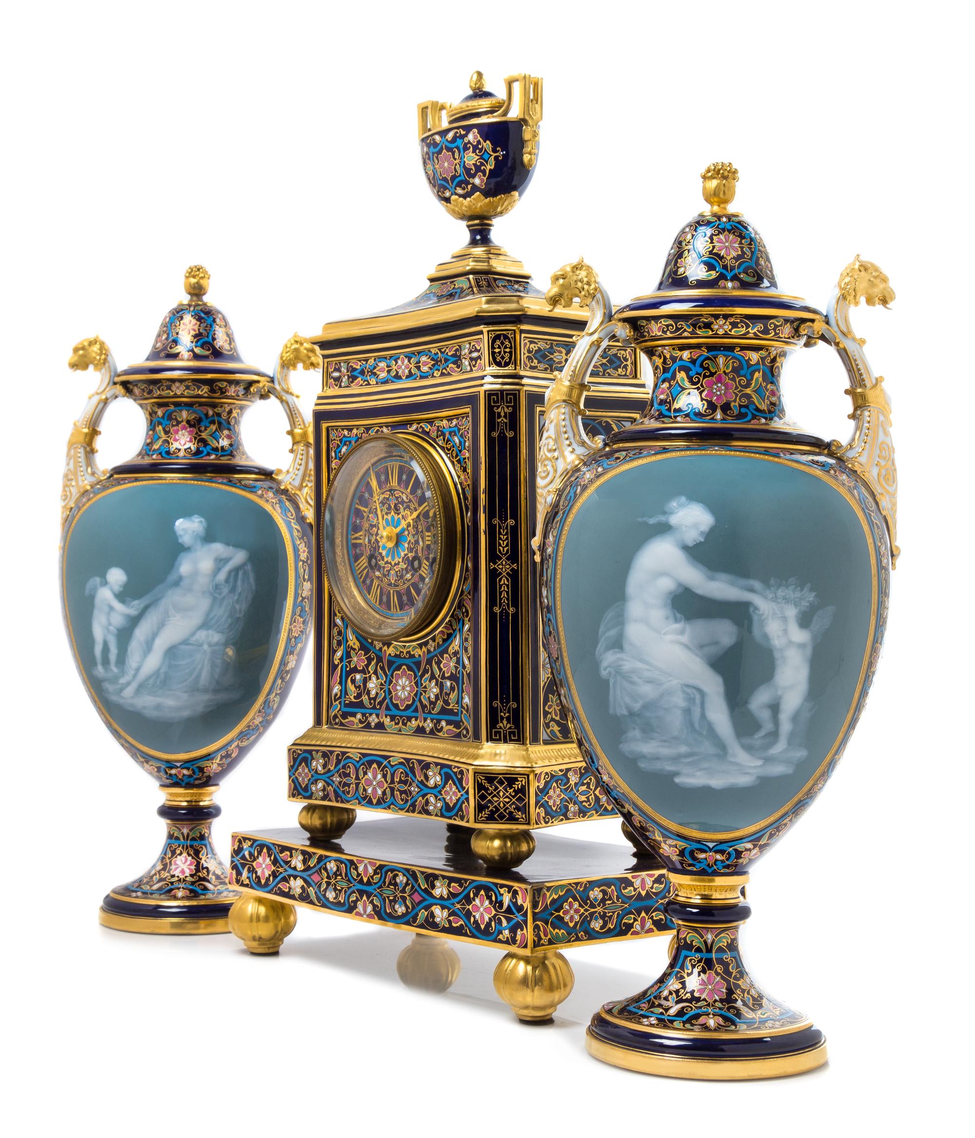 A Meissen Porcelain Pate-sur-Pate Four-Piece Clock Garniture