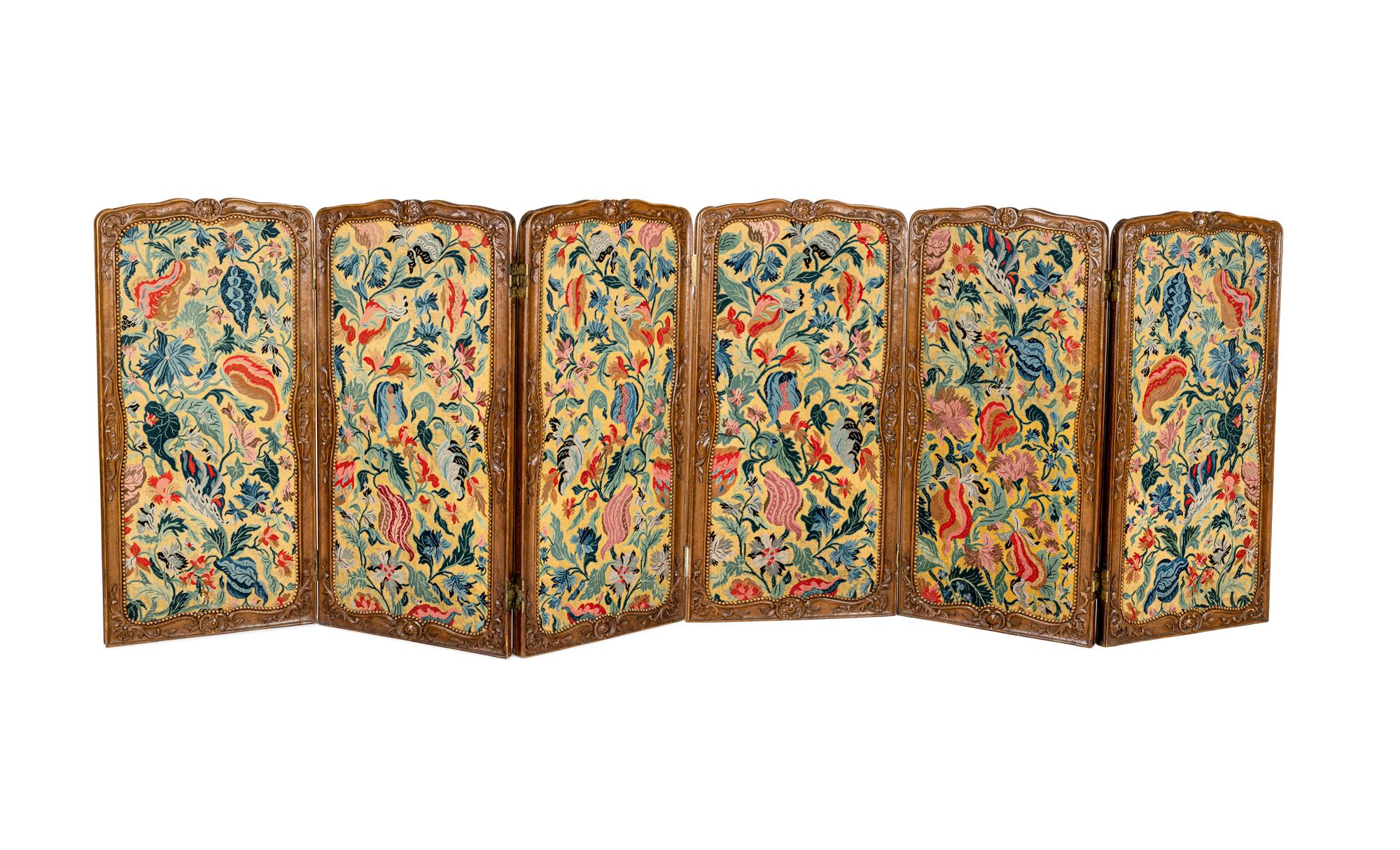 A Louis XV Style Carved Walnut Six-Panel Needlework Inset Screen 19th Century Note: Our specialists have confirmed that this item is over 100 years old.