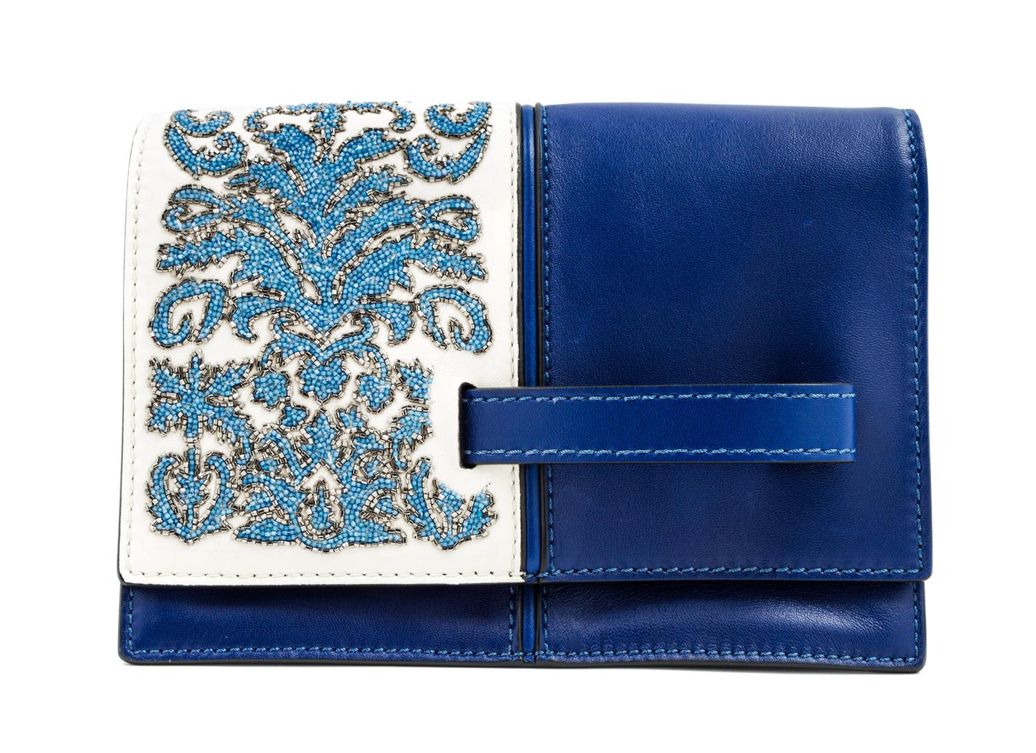 A Valentino Garavani Blue Leather Clutch, 9" x 7" x 3.25".