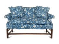 A George III Style Mahogany Settee Upholstered in Blue and White Linen