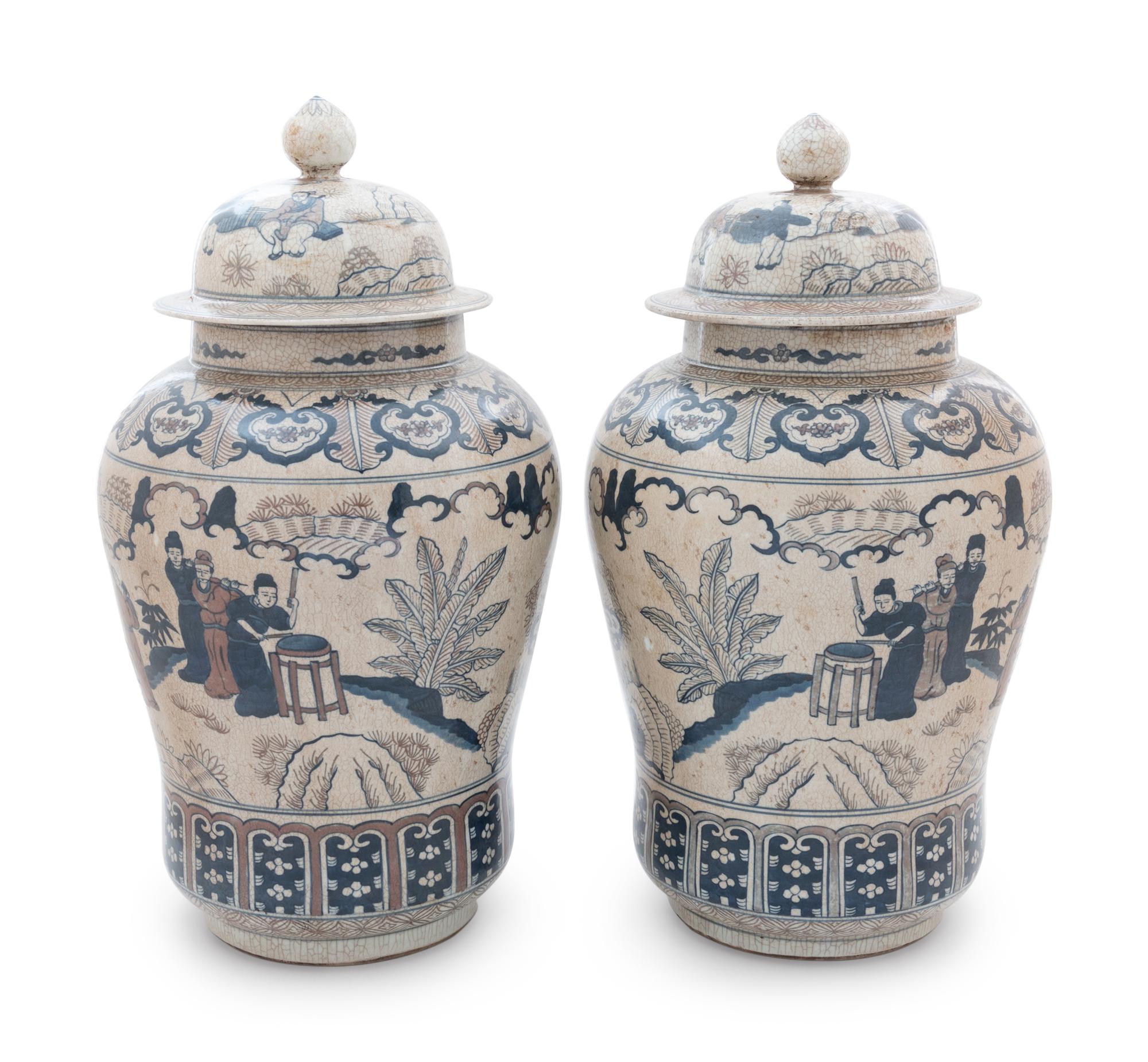 A Pair of Chinese Crackle Ground Underglaze Blue and Iron-Red Covered Vase