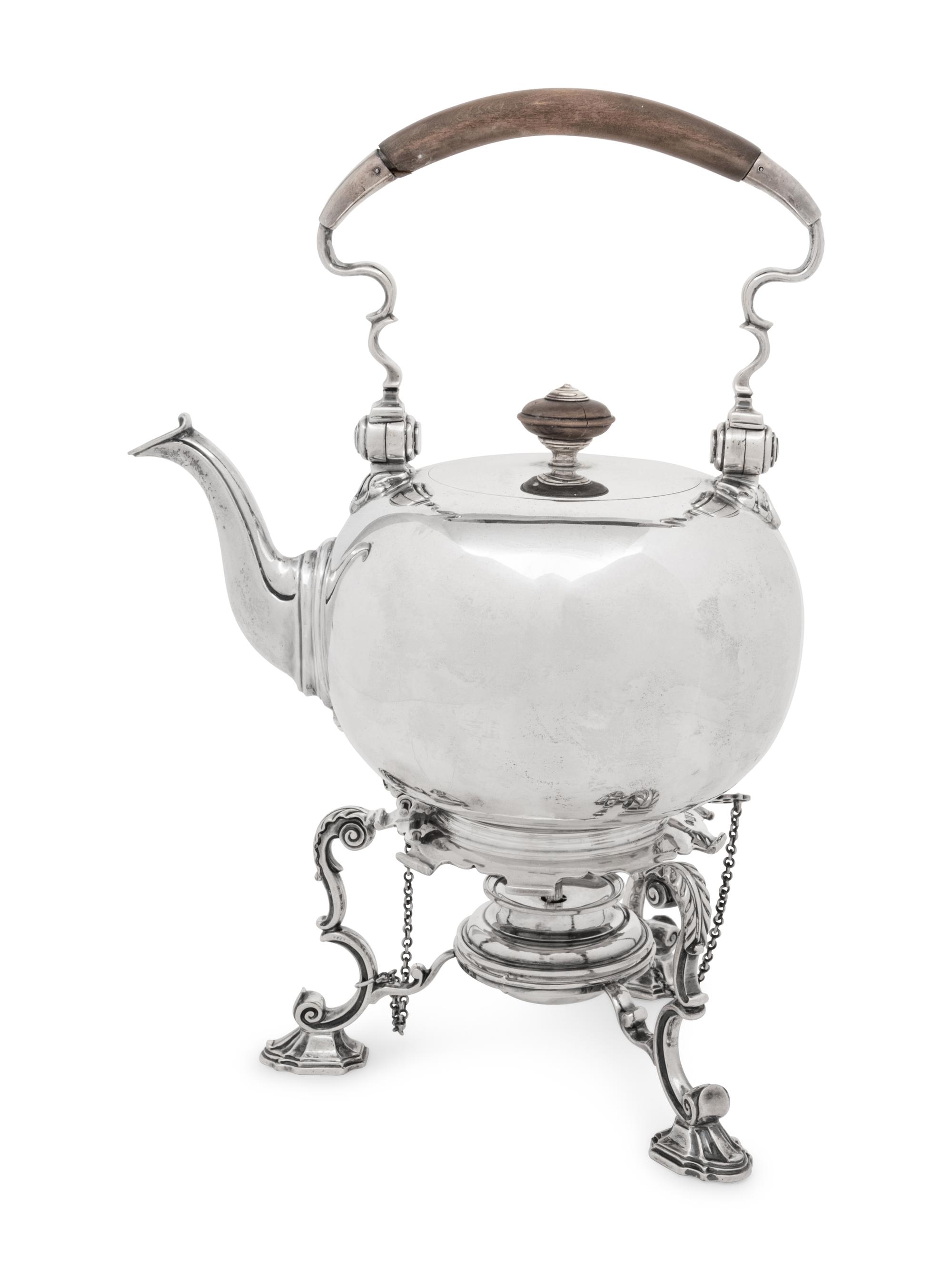 An English Silver Kettle on Lamp Stand