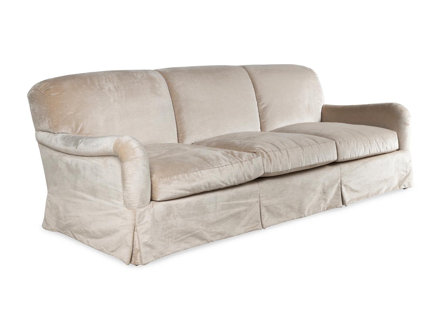 A Velvet-Upholstered Three-Cushion Sofa