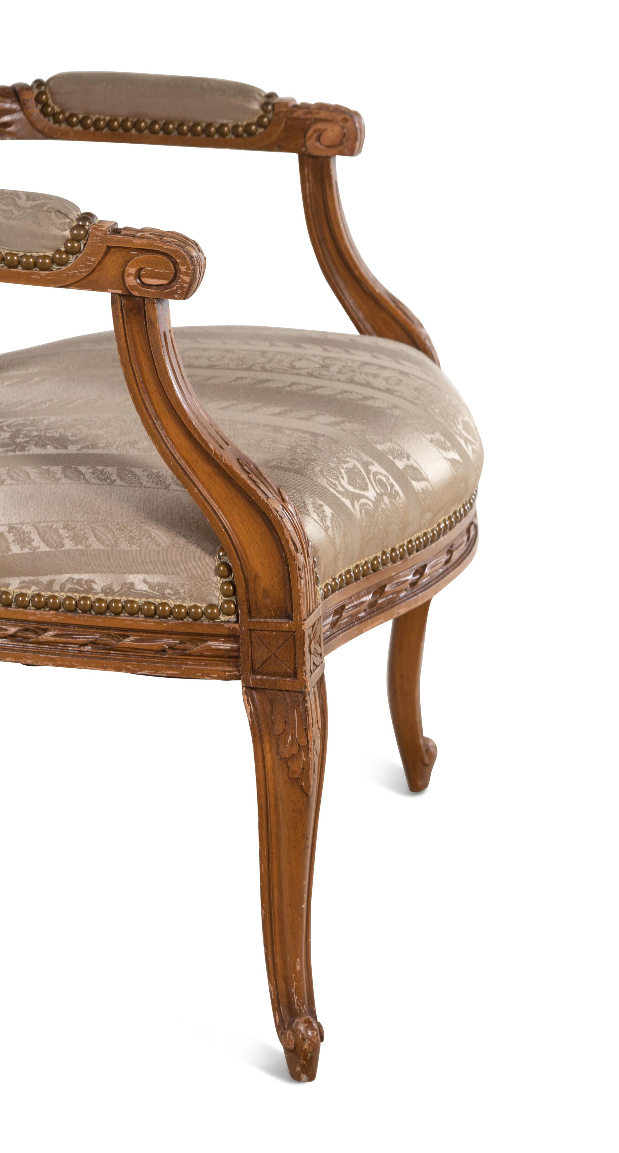 A Pair of Louis XVI Style Fauteuils