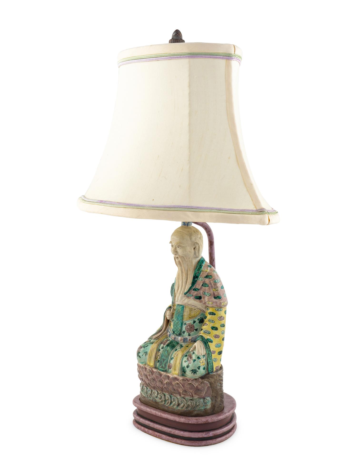 A Chinese Porcelain Figure of an Immortal