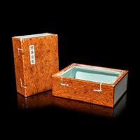 A Chinese Faux Bois Decorated Porcelain 'Books' Box and Cover, Qing Dynasty, 18th-19th Century 清中期 仿木紋釉書式蓋盒