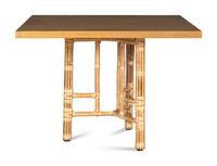 A Set of Four McGuire Rattan Target Armchairs and an Organic Bamboo Table