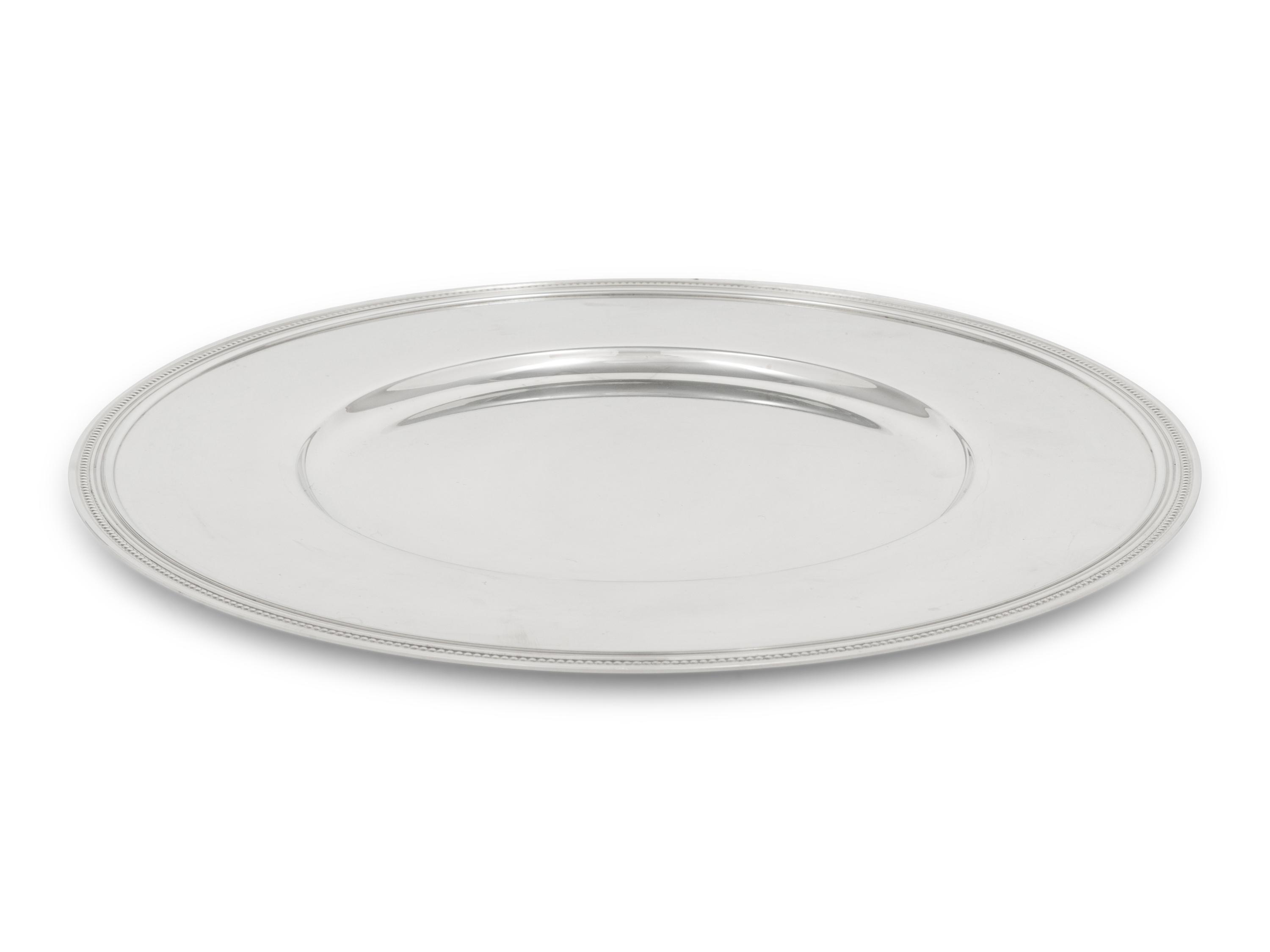 A Set of Ten Christofle Silver-Plate Chargers