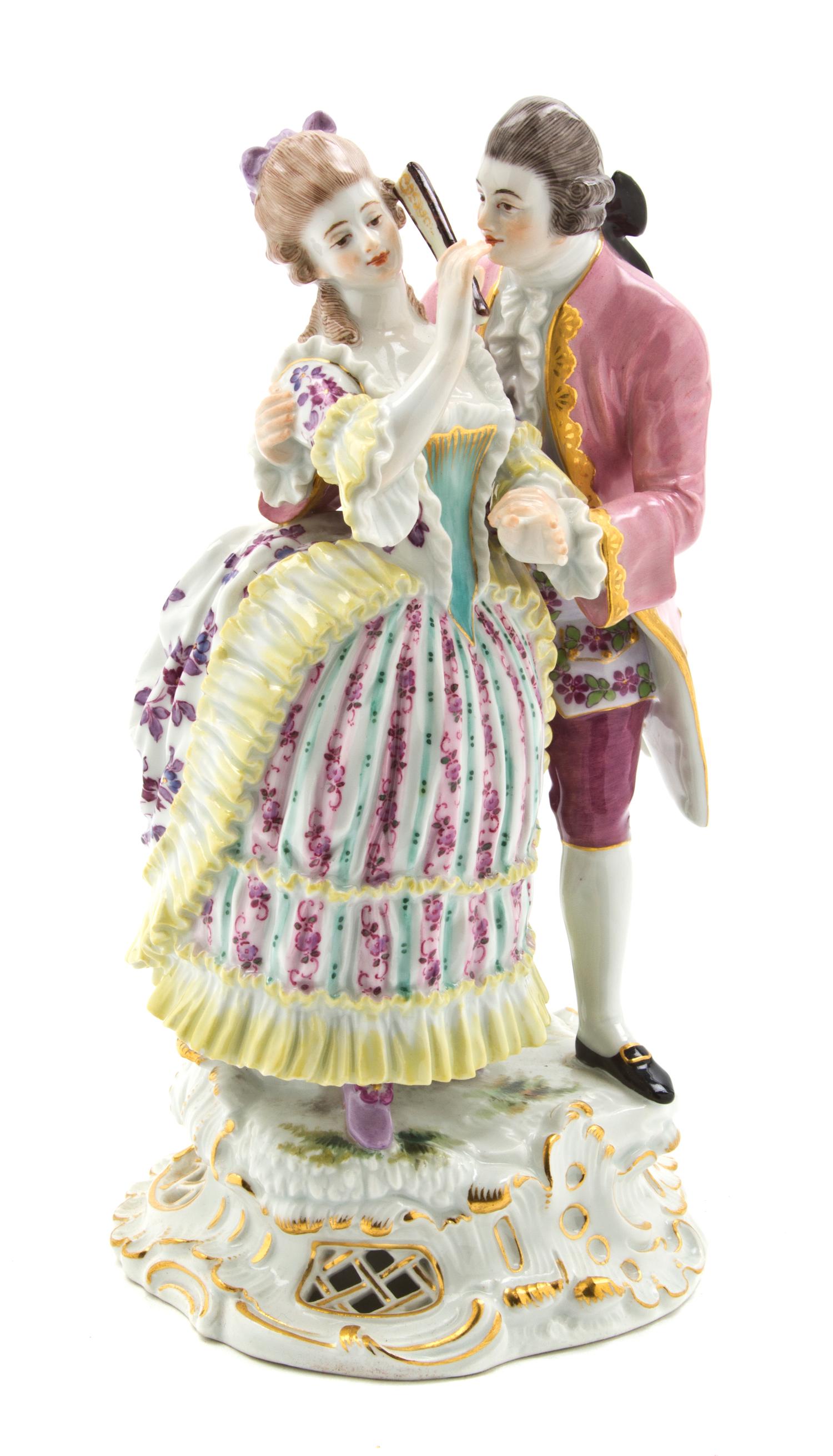 A Meissen Porcelain Figural Group, Height 8 1/2 inches.