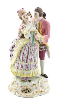 A Meissen Porcelain Figural Group, Height 8 1/2 inches.