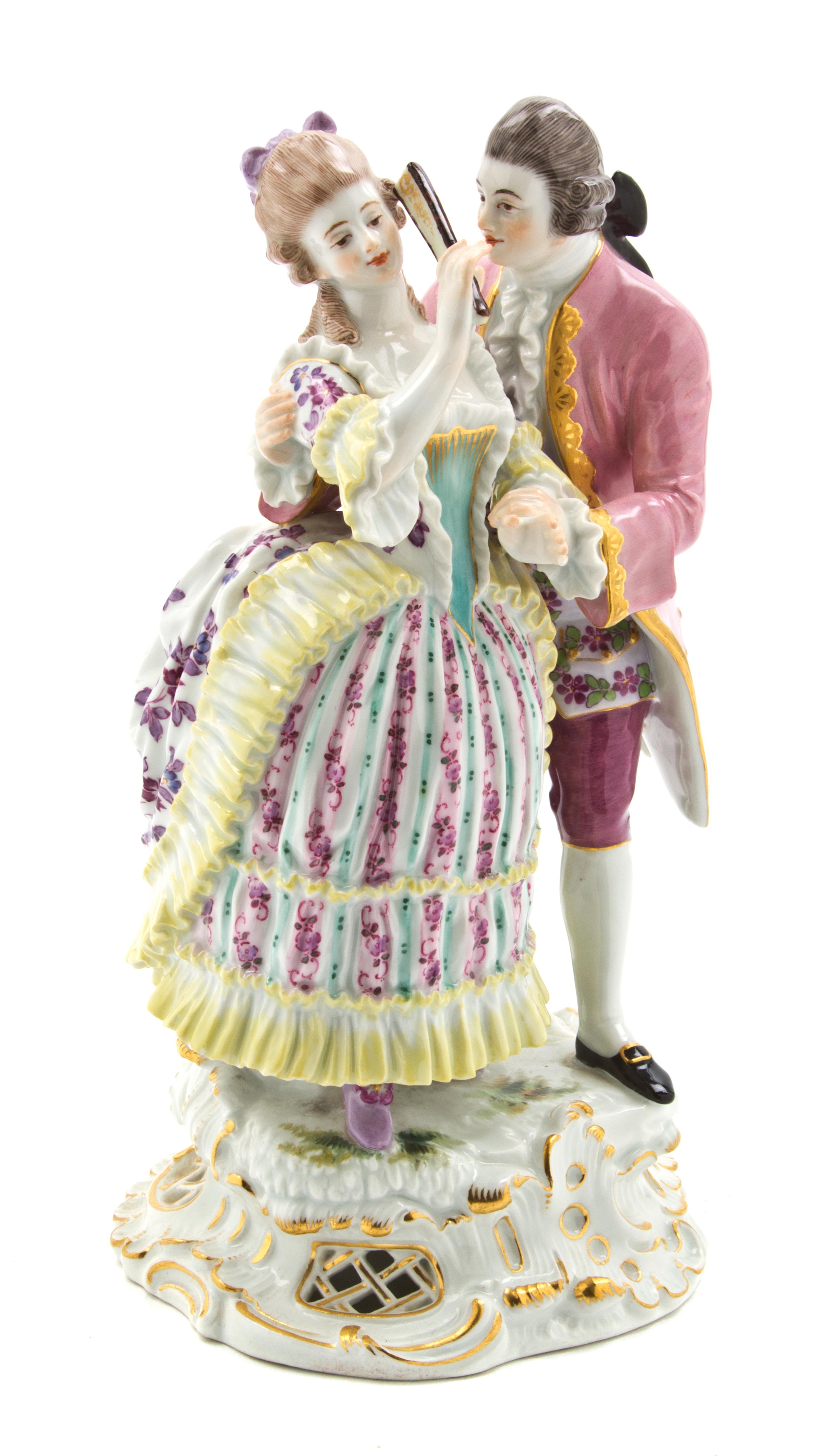 A Meissen Porcelain Figural Group, Height 8 1/2 inches.