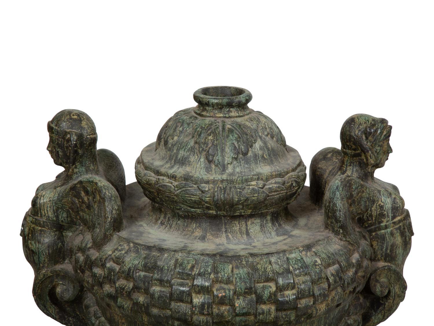 A Pair of Verdigris Patinated Terracotta Urns on Faux Marble Painted Pedestals