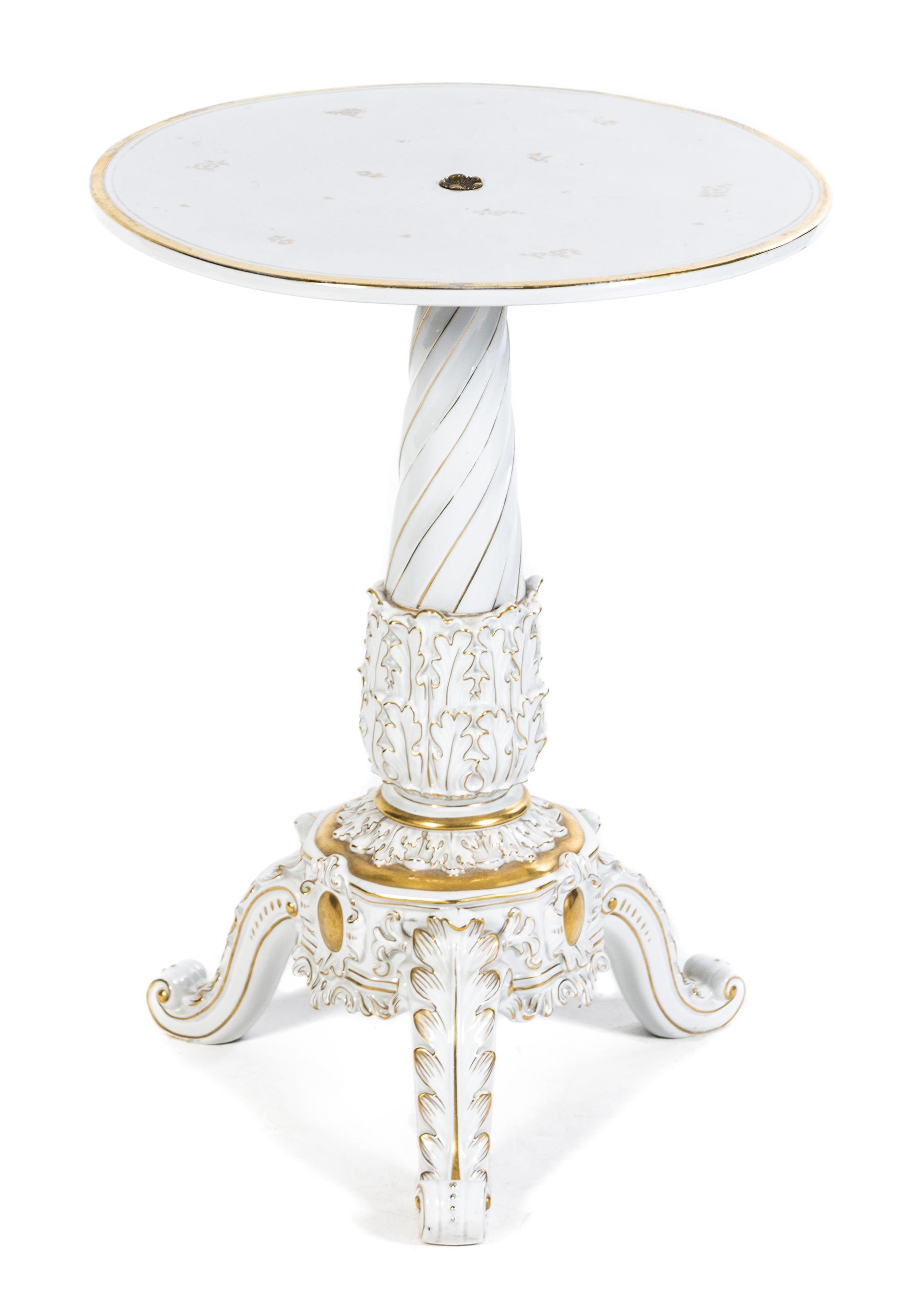 A Continental Porcelain Table Height 24 1/2 x diameter of top 18 inches.