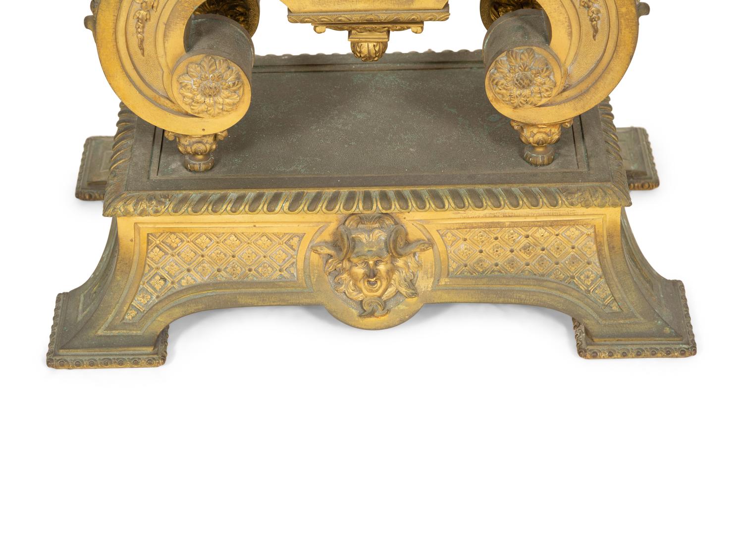A Louis XV Style Gilt Bronze Mantle Clock on Stand