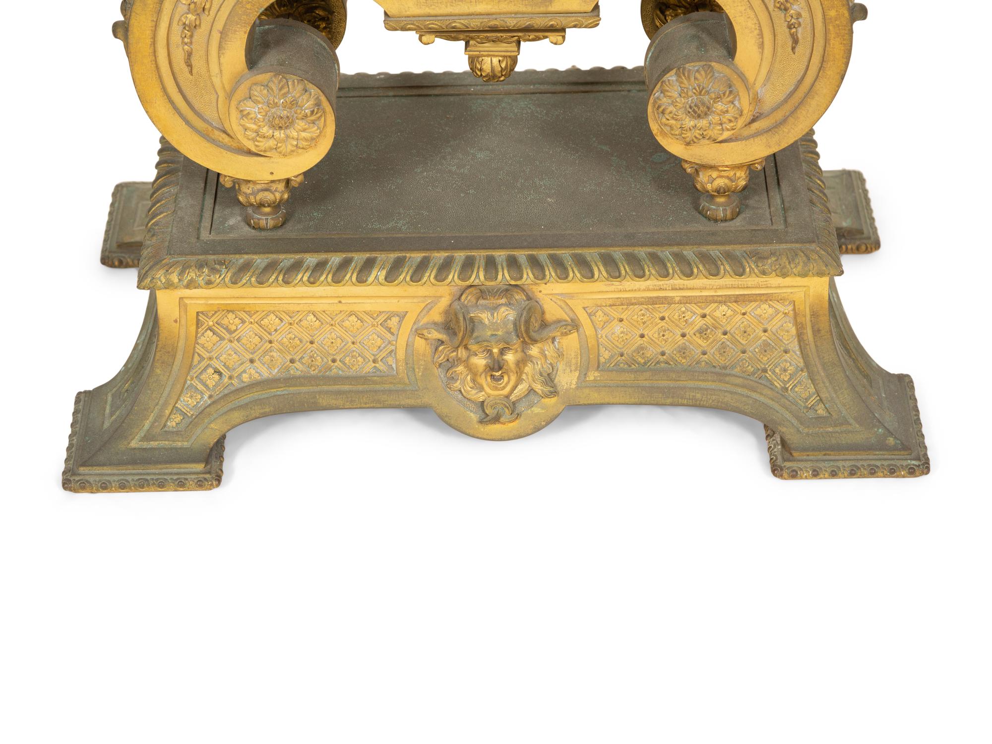 A Louis XV Style Gilt Bronze Mantle Clock on Stand