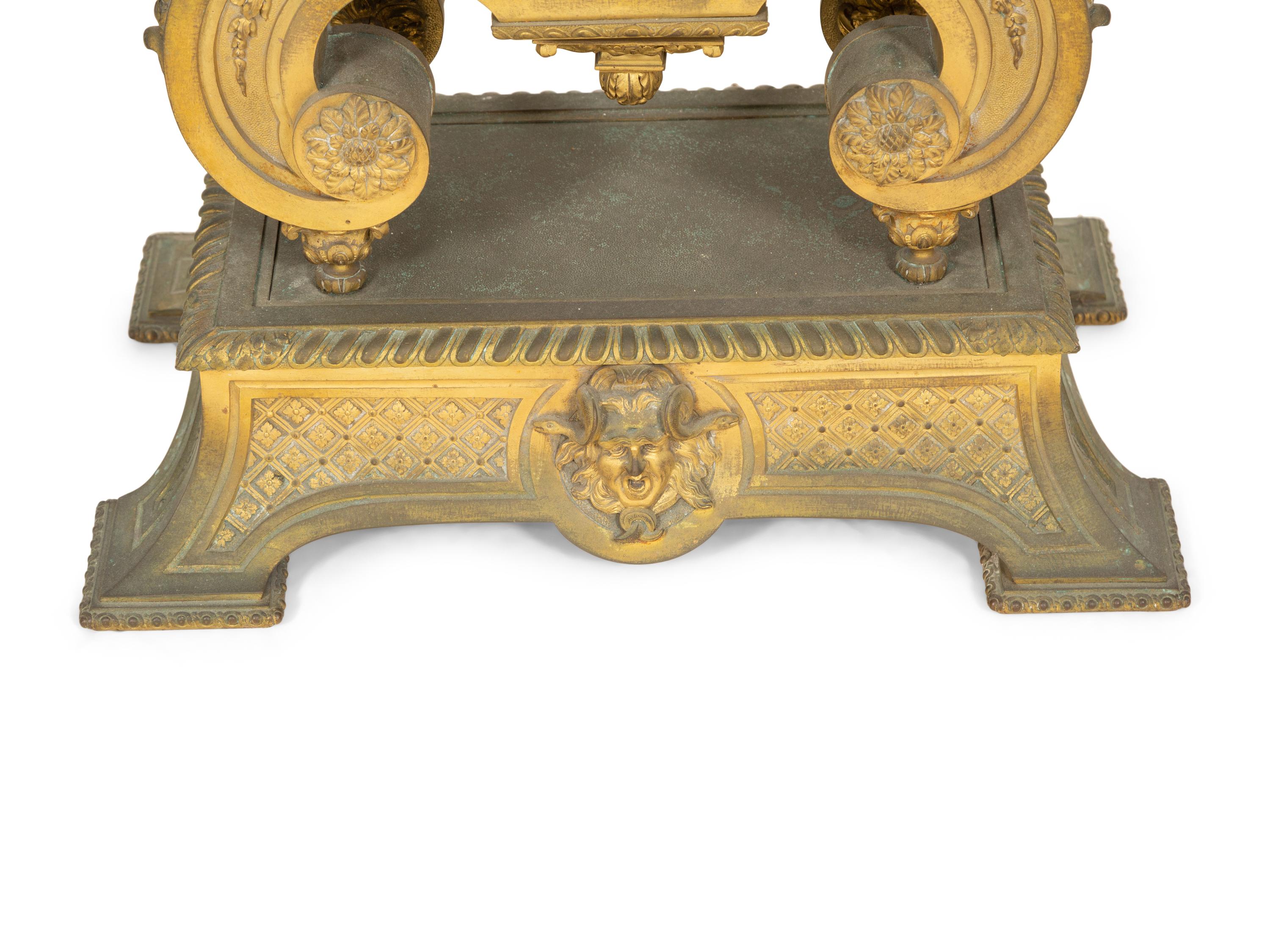 A Louis XV Style Gilt Bronze Mantle Clock on Stand