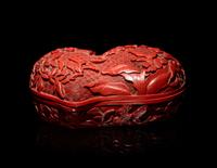 A Chinese Cinnabar Lacquer Double-Peach Form Box and Cover